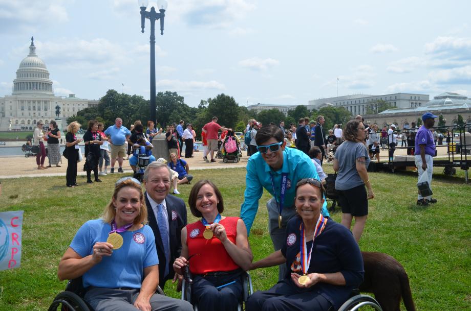 U.S. Senator Dick Durbin (D-IL) met four USA Paralympic champion athletes at the National Council of Independent Living rally today in Washington. Left to right are: Muffy Davis, Dr. Cheri Blauwet, Keith Gabel and Candice Cable.
